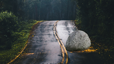 A boulder placed by the king on the road : Hard work can bring anything
